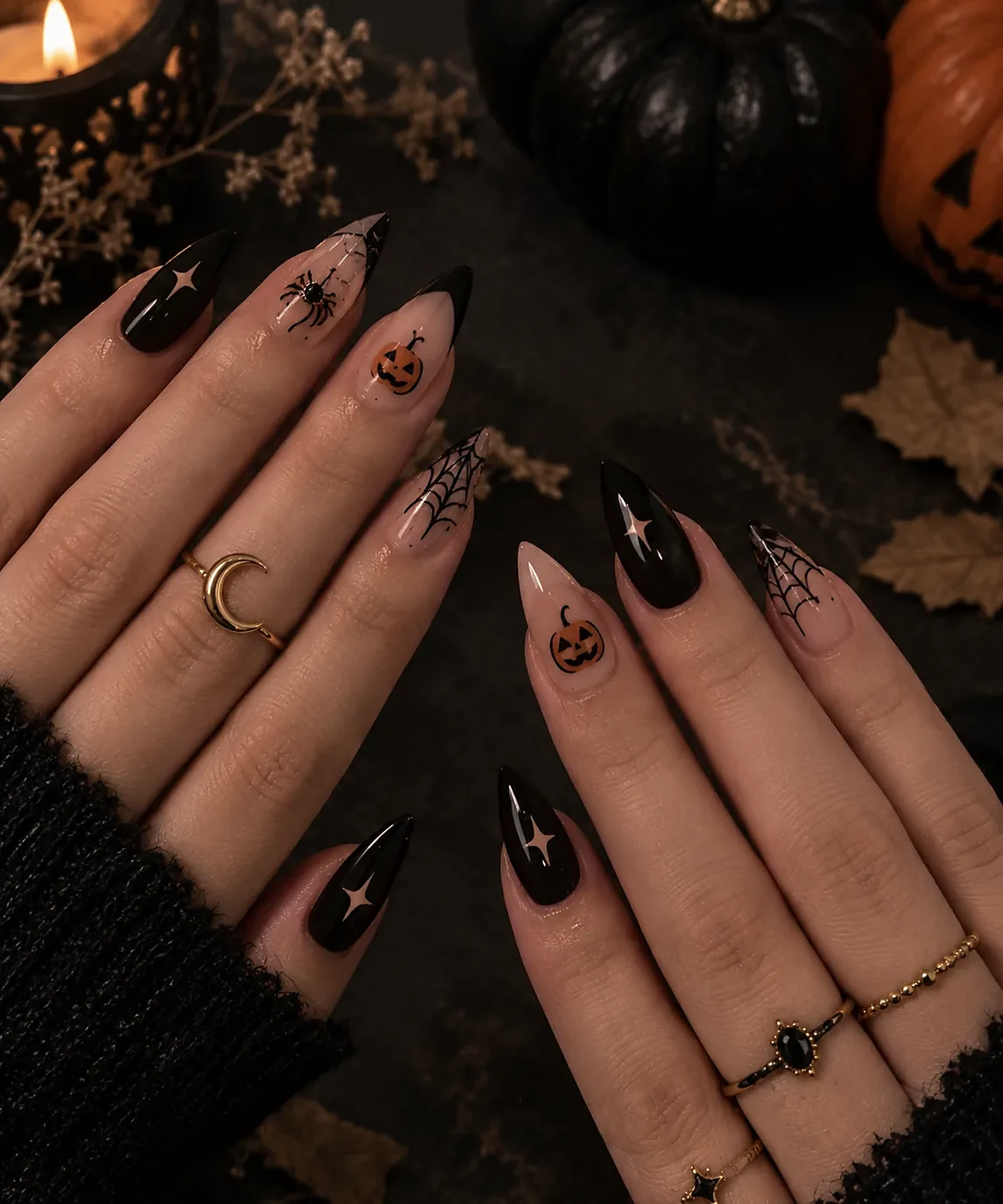 Rich burgundy nails with a delicate spiderweb accent
